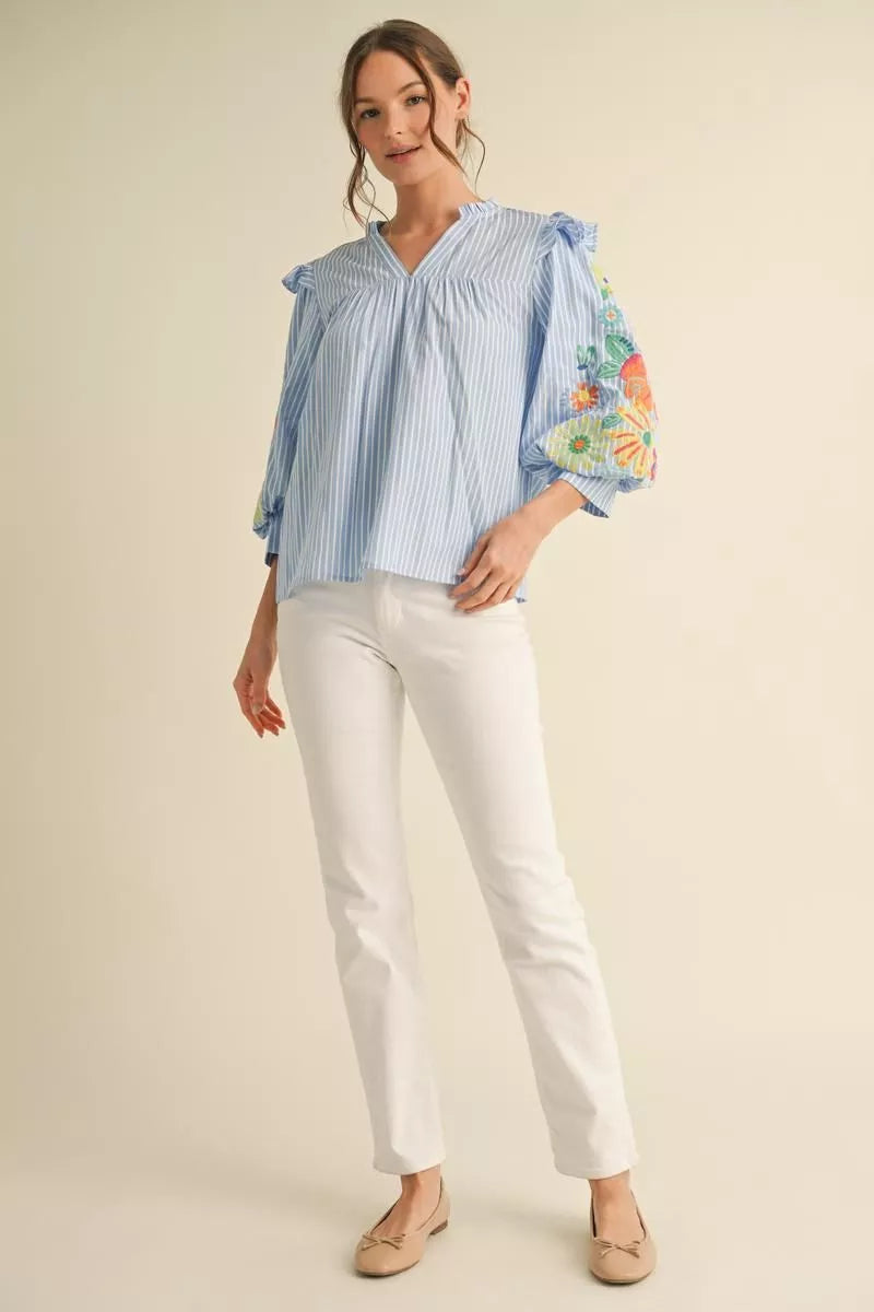 Beautiful Top with 3/4 puff sleeves and embroidered accents in Blue and Pink