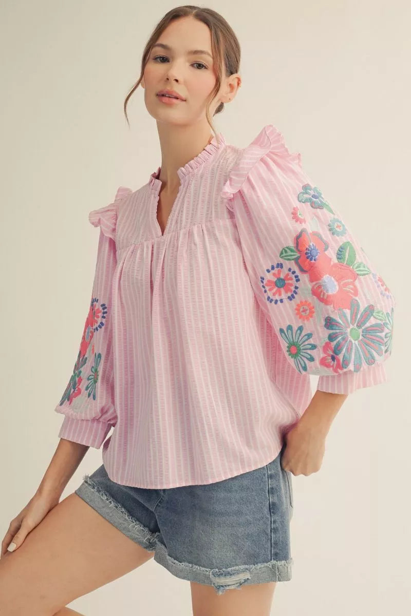 Beautiful Top with 3/4 puff sleeves and embroidered accents in Blue and Pink