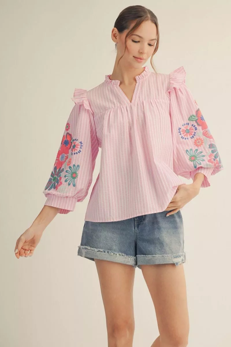 Beautiful Top with 3/4 puff sleeves and embroidered accents in Blue and Pink